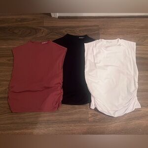 Three Abercrombie and Fitch tank tops. Each worn one time size large.